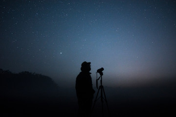 silhouette of the photographer at sunset