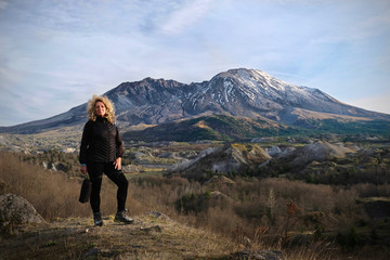 Woman hiking  in Mt St Helens National Volcanic Monument.  Travel Washington State.  United States of America
