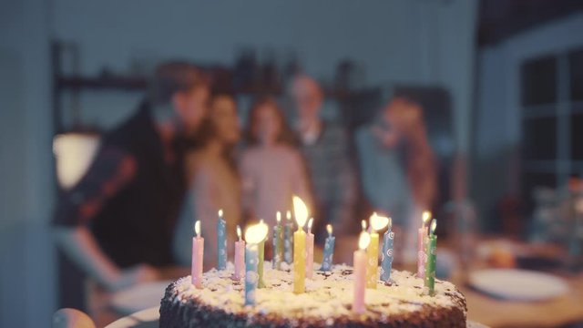 Multi-Generation Family Celebrating Birthday Of Little Girl
