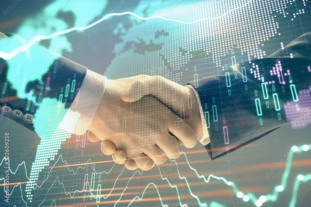 Poster multi exposure of forex graph and world map on abstract background with two businessmen handshake. c