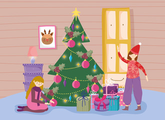 Obraz na płótnie Canvas kids in living room with tree merry christmas, happy new year