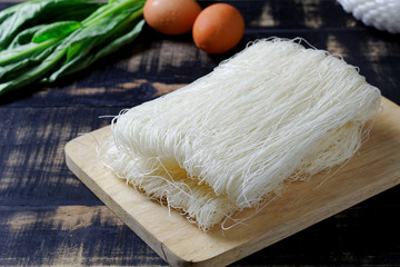 Thai died Rice Vermicelli on wood board,Uncooked