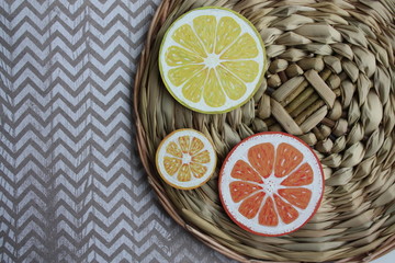 slices of lemon and lime on wooden board