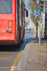 Public transportation / bus in urban surroundings on the street.
