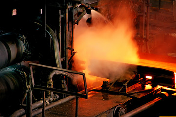 Rolling mill for hot steel in major steelmaking plant.