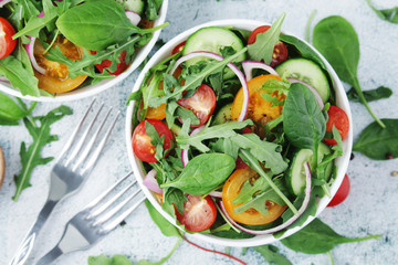 A bowl full of vegetable salad	