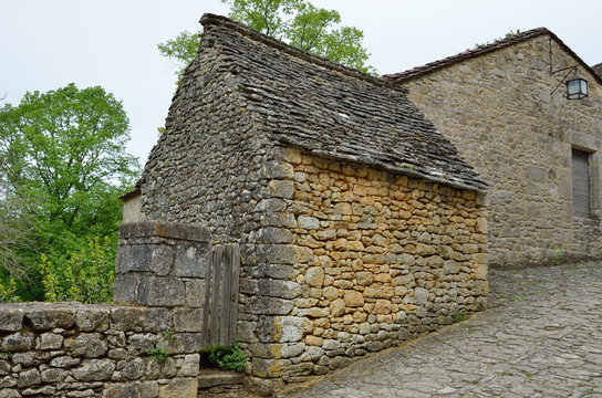 Ancient stone buildings of the French small town in Perigord