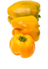 yellow and red bell peppers on a white background
