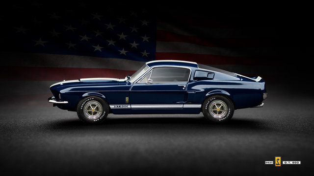 Cagliari, Italy 26/02/2019; Ford Mustang Shelby GT500 1967 lateral view, with white stripes and American Flag on background. Illustrative image of classic  american muscle car.