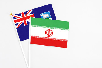 Iran and Falkland Islands stick flags on white background. High quality fabric, miniature national...