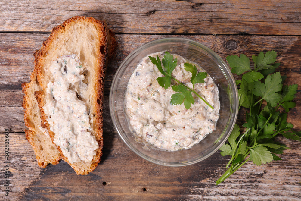 Wall mural bread slice with rillettes, fish spread