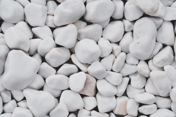 Texture of stones. White round decorative stones.