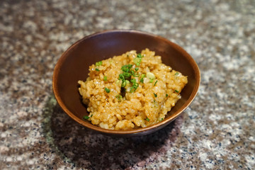 Close up bowl of garlic fried rice