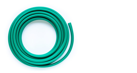 Green garden hose on white background.