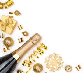 Sparkling wine bottle and Christmas golden decorations on white background