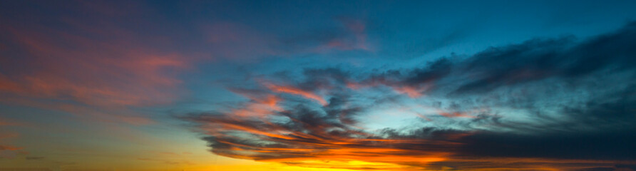 Beautiful sunset - sunrise with clouds. Sky with clouds. Colorful natural background