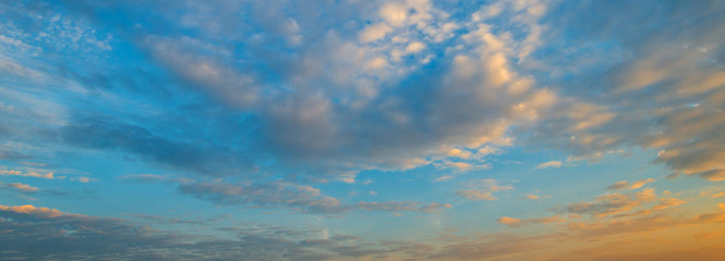 Naklejka na ściany i meble Beautiful sunset - sunrise with clouds. Sky with clouds. Colorful natural background