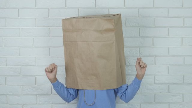 Smile with paper bag.