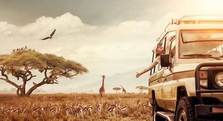 Tuinposter Gelukkige vrouwelijke reiziger op safari in Afrika, reist met de auto in Kenia en Tanzania, kijkt naar het leven van wilde tijgers, giraffen, zebra& 39 s en antilopen in de savanne. © soft_light