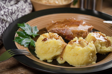 Braised pork neck in own sauce. Shallow depth of field.