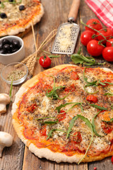 Obraz na płótnie Canvas pizza with tomato sauce, cheese and mushroom