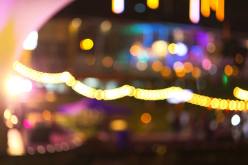 Abstract blur multi-color bogey and light at night background. © titikul_b