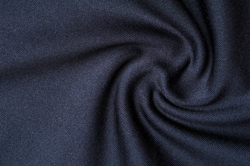 Fragment of crumpled gray polyester wear