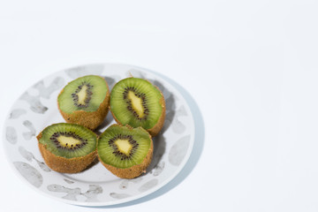 Fototapeta na wymiar Ripe kiwi fruit ideal for breakfast and have a balanced and healthy diet. The kiwi or mangüeyo is the berry of the Actinidia delicious vine.