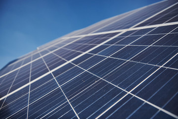 Obraz premium Close up view of polished surface of solar batteries at sunny daytime