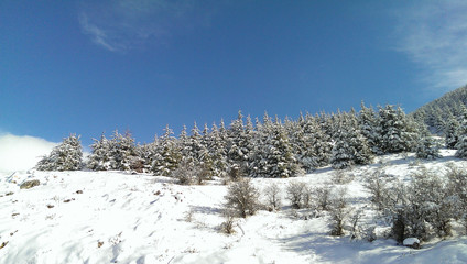 Beautiful landscape of mountainous town in winter, many cozy cottage, eco tourism,Deir El Kamar mountains in Lebanon, wintertime holidays concept