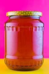 glass jar with honey isolated