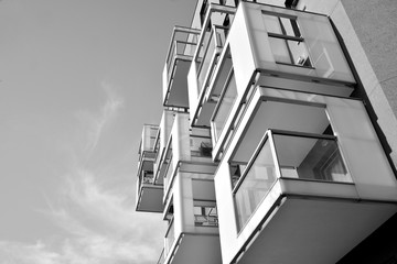 Contemporary apartment building. Generic residential architecture. Black and white.
