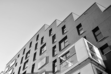 Contemporary apartment building. Generic residential architecture. Black and white.