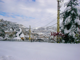 Beautiful landscape of mountainous town in winter, many cozy cottage, eco tourism,Deir El Kamar mountains in Lebanon, wintertime holidays concept