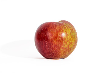 Whole rosy red apple with white background