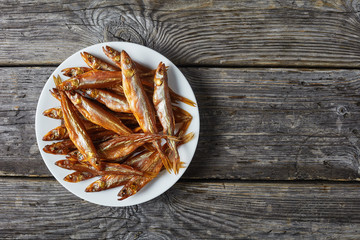 cold smoked smelts on a white plate