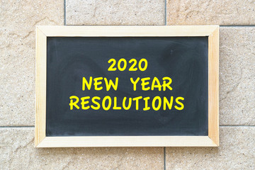 Fototapeta premium 2020 new year goal, plan, action text on black board.