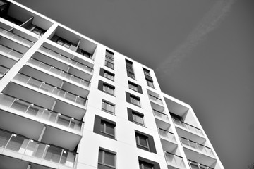 Contemporary apartment building. Generic residential architecture. Black and white.