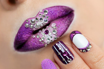 Purple and white nail design on different nail length and shape.Creative nail art.Lip makeup with...