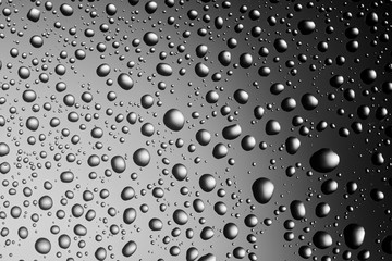 water drops on glass gradient background