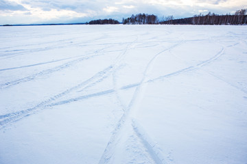 Fototapeta na wymiar Winter lake in the snow