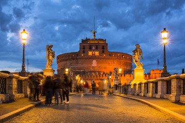 Saint Angel Castle over the Tiber river in Rome at dusk, Italy