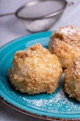 Bread crumb dumplings stuffed with chocolate and nuts