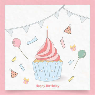 cute cupcake is on white party object.the decoration are among sweet flag ballon ribbon candle and hat.the picture is suitable for party card.the design is very adorable food birthday dessert.