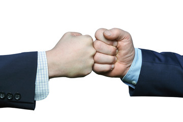 Clash of young and senior businessmen fists isolated on the white background. Conflict and...