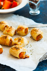 Puff pastry rolls with pumpkin and cheese filling.