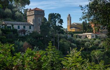 Fototapeta na wymiar Portofino Ligurie Italy. Mediterranean Sea and coast. Church tower
