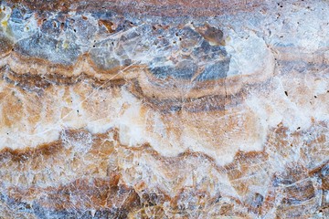 Rusty brown stone surface texture background close up