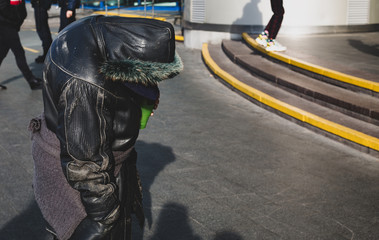 homeless woman asks for money
