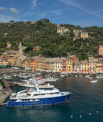 Fototapeta na wymiar Portofino Ligurie Italy. Mediterranean Sea and coast. Harbor. Boats and superyacht